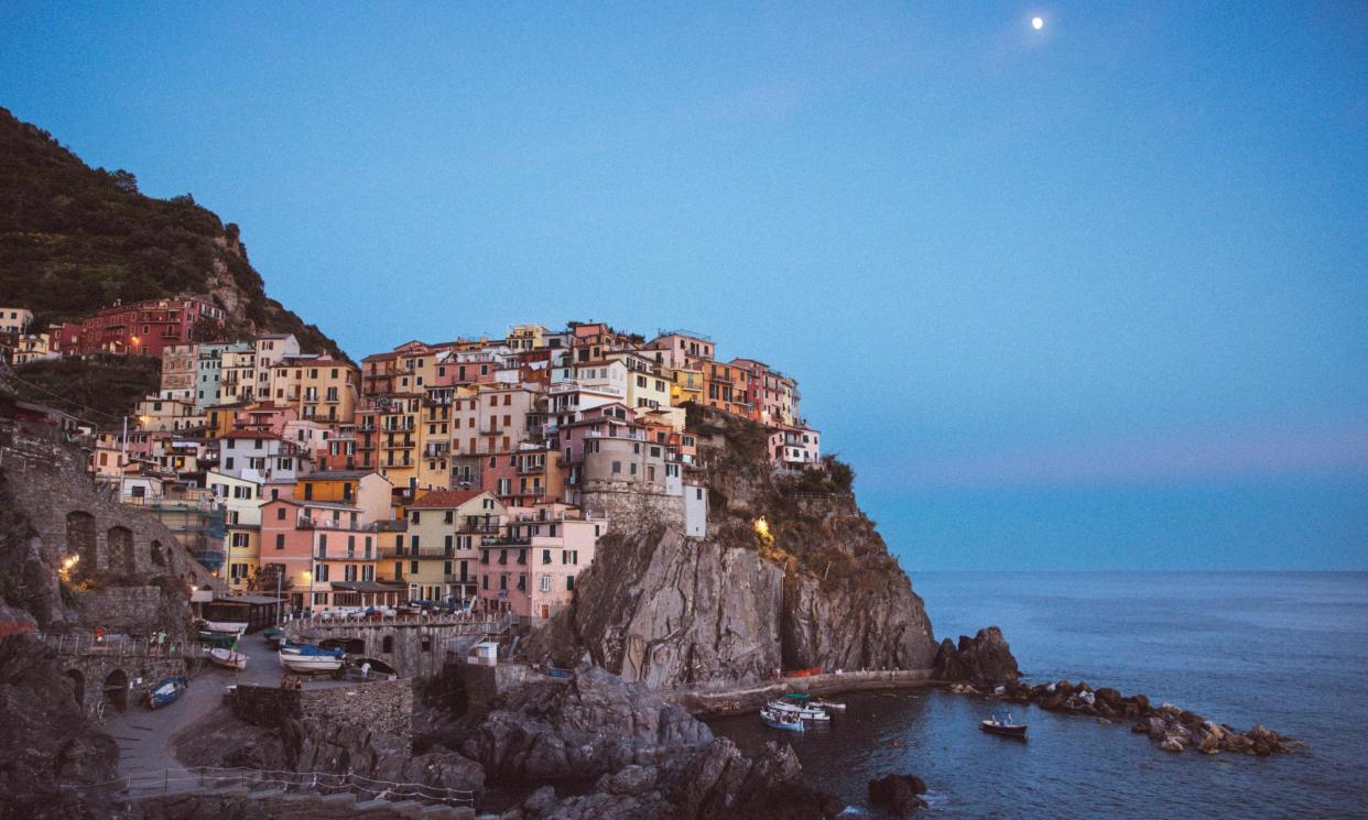 <span>The coastal path connects Manarola, pictured, with Riomaggiore, farther south.</span><span>Photograph: Roberto Salomone/Roberto Salomone/The Observer</span>