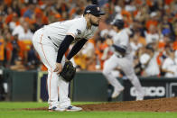 Houston Astros relief pitcher Roberto Osuna reacts after giving up a two-run home run to New York Yankees' DJ LeMahieu during the ninth inning in Game 6 of baseball's American League Championship Series Saturday, Oct. 19, 2019, in Houston. (AP Photo/Matt Slocum)