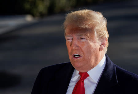 U.S. President Donald Trump speaks to the media as he departs for Camp David from the White House in Washington, U.S., January 6, 2019. REUTERS/Joshua Roberts