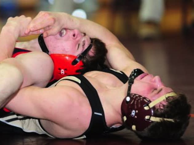 Michael Shanahan (right) took up wrestling to let out his aggression, which seems to be working out quite well -- Chicago Sun-Times