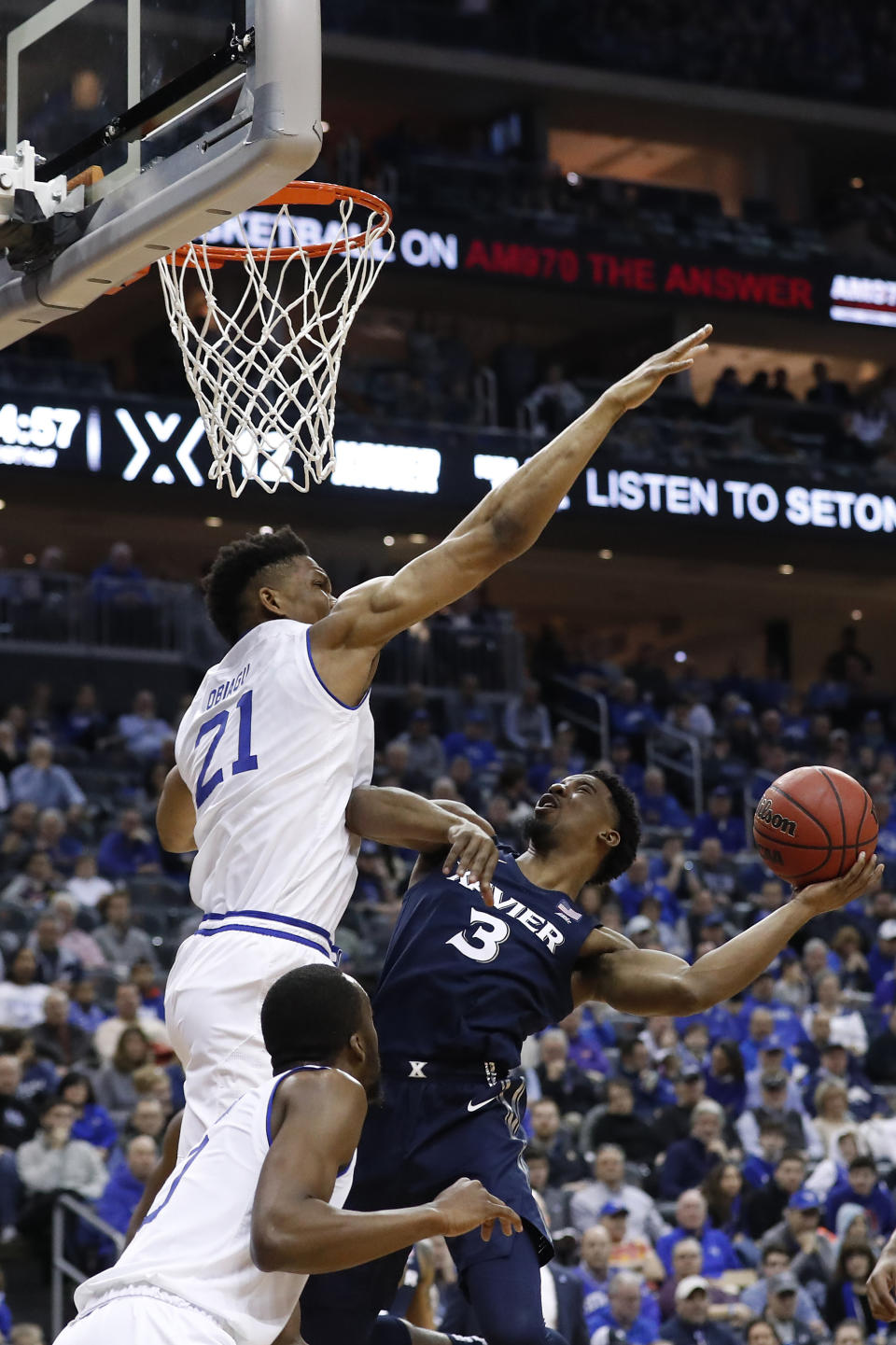 Seton Hall's Ike Obiagu (21) defends against Xavier's Quentin Goodin (3) during the first half of an NCAA college basketball game, Saturday, feb. 1, 2020, in Newark, N.J. (AP Photo/Michael Owens)