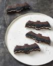 <p>Add a little sparkle to the wings of these bat cookies with black sanding sugar. </p><p><em><a href="https://www.goodhousekeeping.com/food-recipes/party-ideas/a28609240/bat-sandwich-cookies-recipe/" rel="nofollow noopener" target="_blank" data-ylk="slk:Get the recipe for Bat Sandwich Cookies »;elm:context_link;itc:0;sec:content-canvas" class="link ">Get the recipe for Bat Sandwich Cookies »</a></em></p><p><strong><strong>RELATED: </strong></strong><a href="https://www.goodhousekeeping.com/holidays/halloween-ideas/g244/halloween-desserts/" rel="nofollow noopener" target="_blank" data-ylk="slk:Spooky Halloween Desserts and Treats You Need to Make this October;elm:context_link;itc:0;sec:content-canvas" class="link ">Spooky Halloween Desserts and Treats You Need to Make this October</a></p>