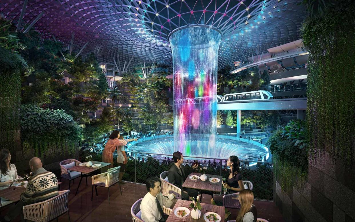 Jewel's 'rain vortex' is its indoor waterfall - changi airport