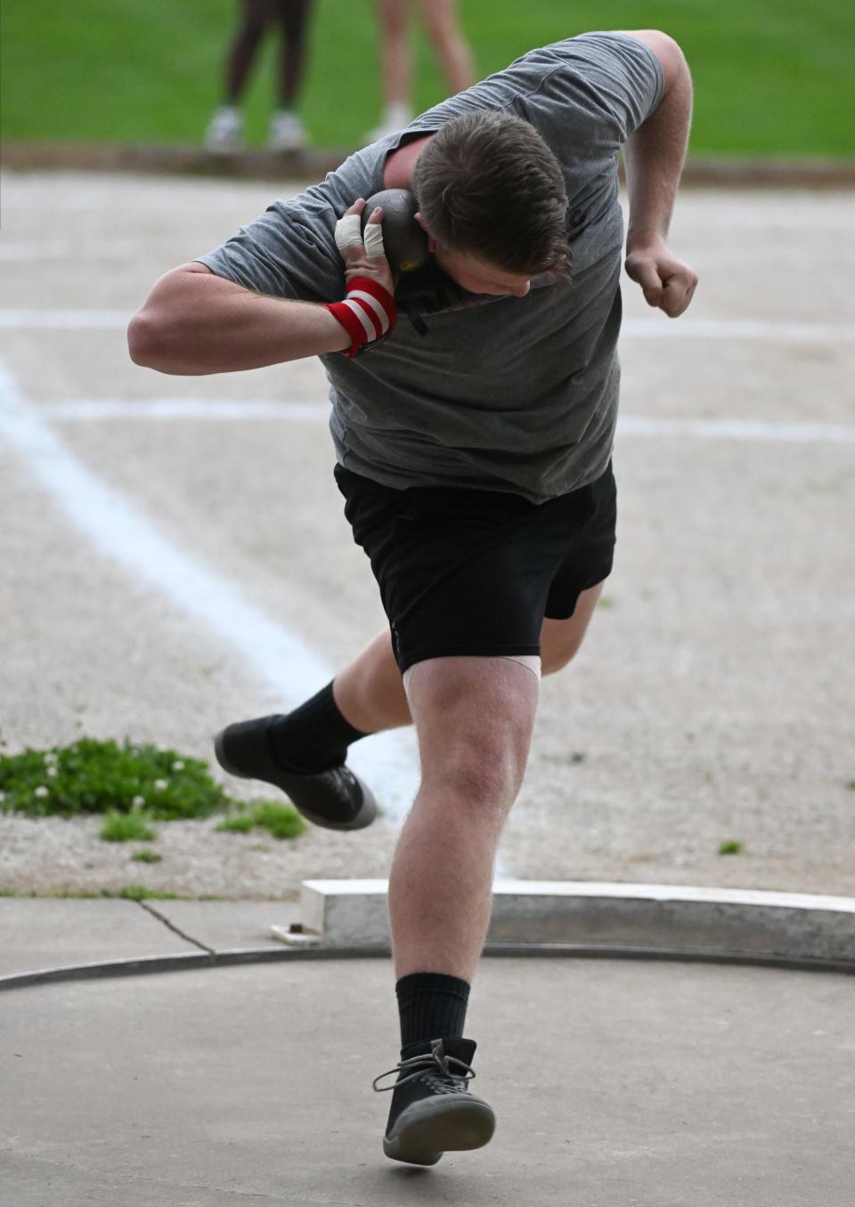Edgewood’s Chris Davis competes in the shot put during the IHSAA boys’ track and field sectional championship at Bloomington North on Thursday, May 16, 2024.