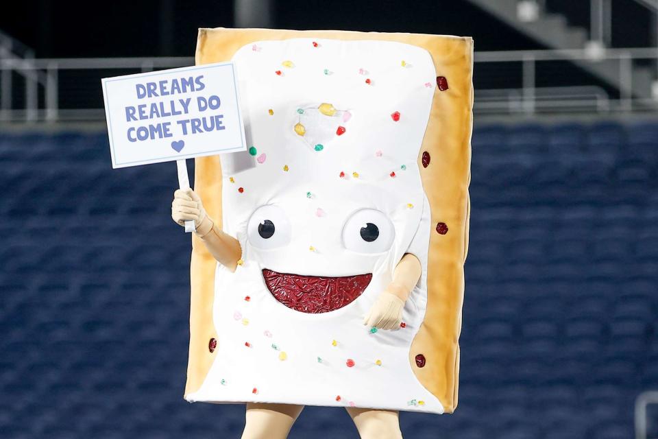 <p>David Rosenblum/Icon Sportswire via Getty</p> The Pop-Tart Bowl mascot, Strawberry, after the game between the North Carolina State Wolfpack and the Kansas State Wildcats on December 28, 2023 at Camping World Stadium in Orlando, Fl.