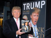 <p>Donald Trump holds a copy of his new book “Think Big and Kick Ass” at Barnes & Noble in New York City on Oct. 16, 2007. <i>(Photo: George Napolitano/FilmMagic)</i> </p>