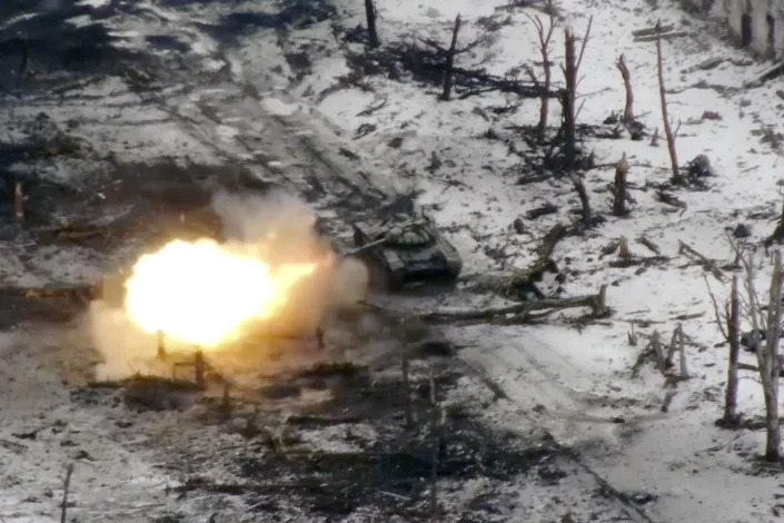 New video footage shot on Feb. 19, 2023 from the air with a drone for The Associated Press shows how particularly intense fighting since the Feb. 24, 2022, invasion has left no building in Marinka intact. Russian tank fire further added to the destruction, pounding what appeared to be Ukrainian positions amid the ruins. (AP Photo)