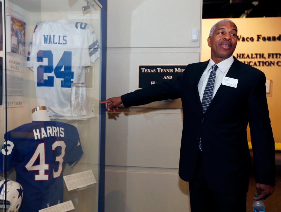 Former Dallas Cowboys cornerback Everson Walls stands near his jersey before the 2015 Texas Sports Hall of Fame induction class news conference in Waco, Texas, April 9, 2015.