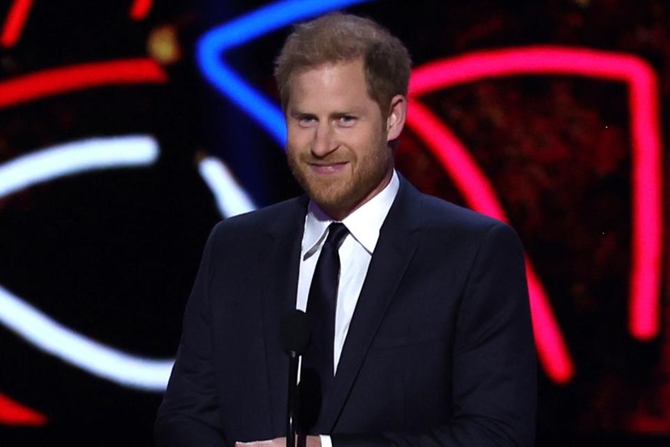 <p>Perry Knotts/Getty</p> Prince Harry presents the Walter Payton Man of the Year Award at the 13th Annual NFL Honors on February 8, 2024 in Las Vegas