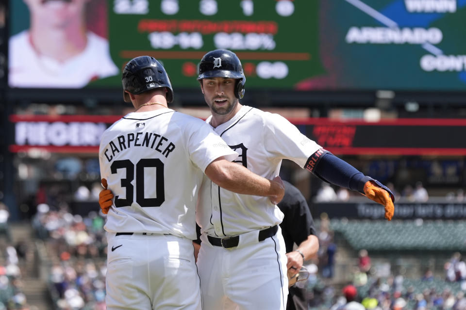 Detroit Tigers' Matt Vierling is greeted by Kerry Carpenter after hitting a two-run home run during the third inning of a baseball game against the St. Louis Cardinals, Wednesday, May 1, 2024, in Detroit. (AP Photo/Carlos Osorio)