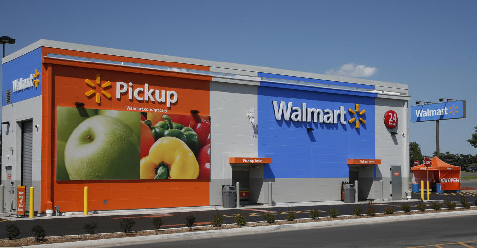 FILE - A 24-hour grocery pickup location at a Walmart in Oklahoma City, on May 30, 2017. U.S. demand for grocery delivery is cooling as food prices rise. Some shoppers are shifting to less expensive grocery pickup, while others are returning to the store. (AP Photo/Sue Ogrocki, File)