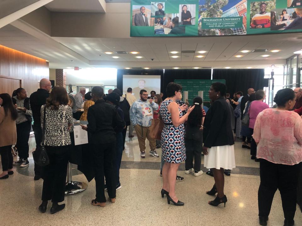 People gathered inside Binghamton University's Downtown Center Thursday, April 20, 2023 to provide feedback on five designs for the Harriet Tubman statue that will be placed behind the center.