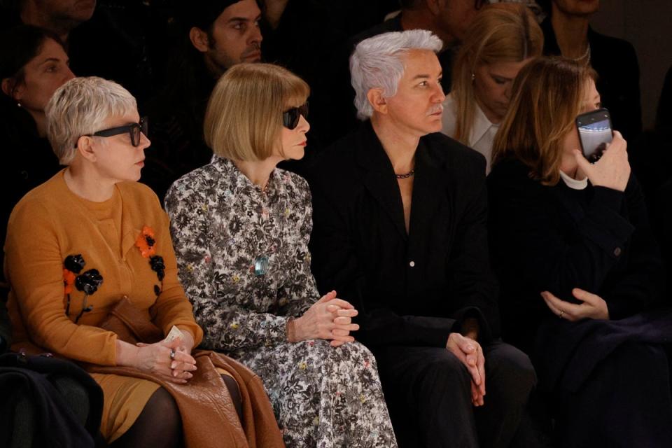 Catherine Martin, Anna Wintour and Baz Luhrmann attend the Chanel Haute Couture show (AFP via Getty Images)