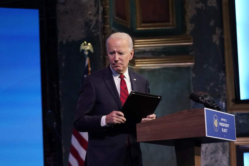 President-elect Joe Biden leaves after speaking at an event at The Queen theater, Friday, Jan. 15, 2021, in Wilmington, Del. (AP Photo/Matt Slocum)