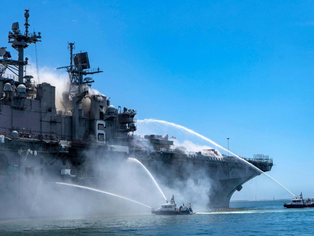 USS Bonhomme Richard at Naval Base San Diego, on fire on Sunday: EPA
