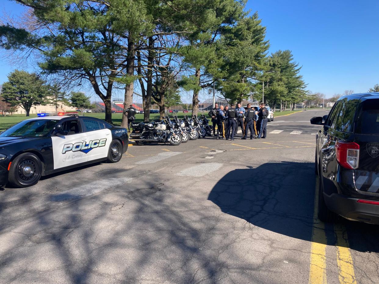 Falls police and other departments from lower bucks stage near Pennsbury High School after a report to shelter in place was sent to to township residents Saturday morning.