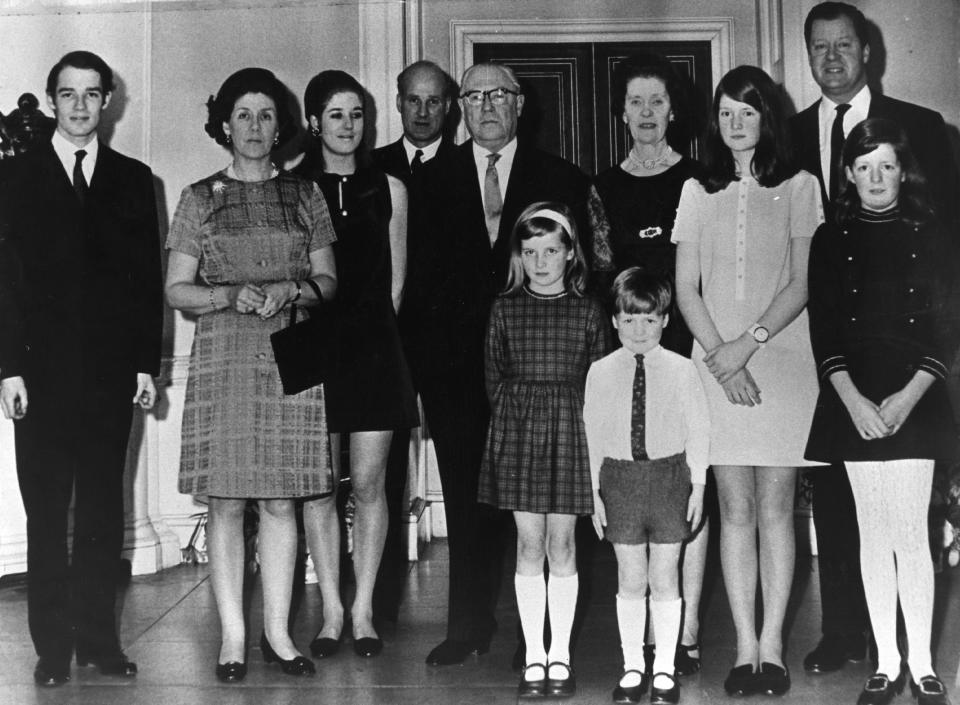 From left to right: Richard Wake-Walker, Lady Anne Wake-Walker, Elizabeth Wake-Walker, Christopher Wake-Walker, Earl Spencer, Countess Spencer, Lady Sarah Spencer, Viscount Althrop, Lady Jane Spencer. Lady Diana Spencer and Charles Spencer stand in the front. (Getty Images)