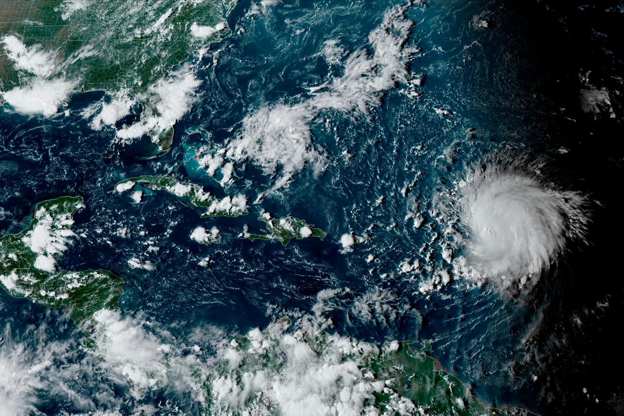 Hurricane Lee is pictured by NOAA satellite in the Atlantic Ocean on 8 September. (AP)