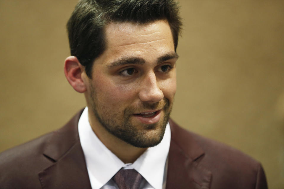 Boston Red Sox pitcher Nathan Eovaldi speaks with the media during the Major League Baseball winter meetings, Monday, Dec. 10, 2018, in Las Vegas. (AP Photo/John Locher)