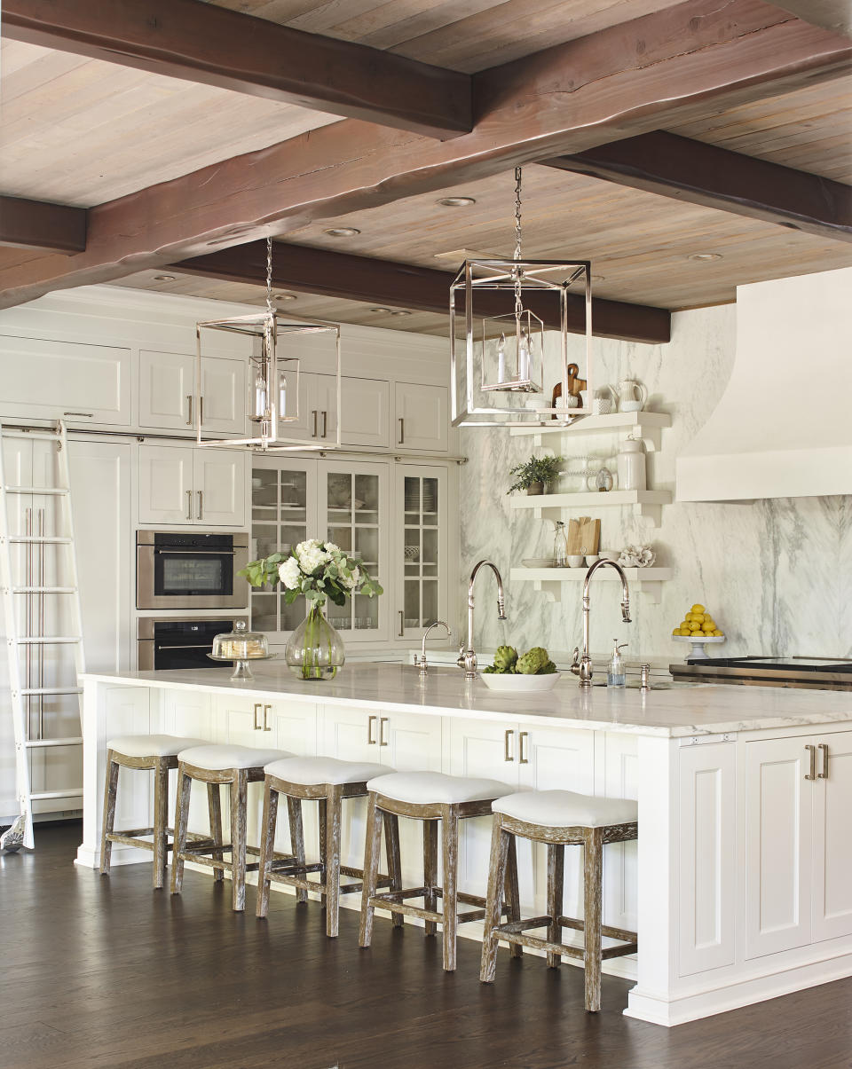 12. Use white cabinets to make your home's original features the star