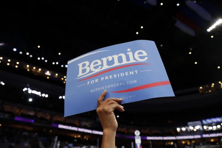 A supporter of Bernie Sanders holds up a sign during the Democratic National Convention in Philadelphia. (Photo: Carolyn Kaster/AP)