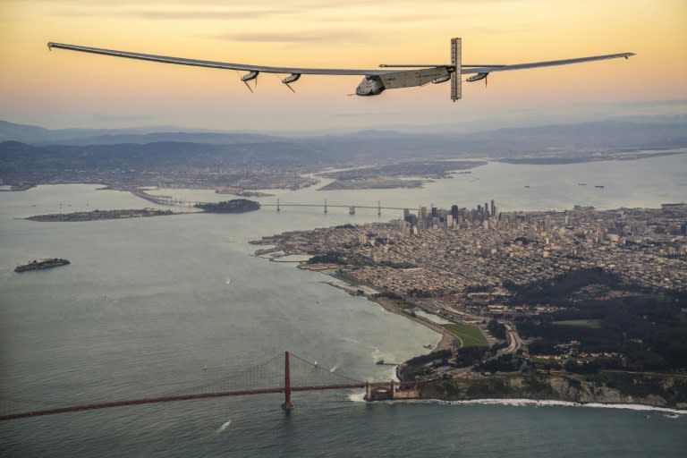 Solar Impulse 2, a solar-powered plane, flies over San Francisco on April 23, 2016