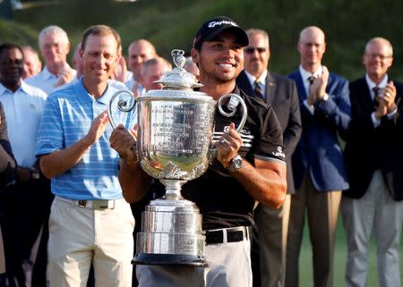 Aug 16, 2015; Sheboygan, WI, USA; Jason Day celebrates with the Wanamaker Trophy after winning the 2015 PGA Championship golf tournament at Whistling Straits. Mandatory Credit: Brian Spurlock-USA TODAY Sports