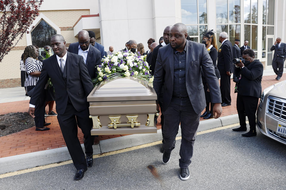 The casket of Irvo Otieno is carried out of First Baptist Church of South Richmond after the celebration of life for Irvo Otieno in North Chesterfield, Va., on Wednesday, March 29, 2023. Irvo Otieno, a 28-year-old Black man, died after he was pinned to the floor by seven sheriff's deputies and several others while he was being admitted to a mental hospital. (Eva Russo/Richmond Times-Dispatch via AP)