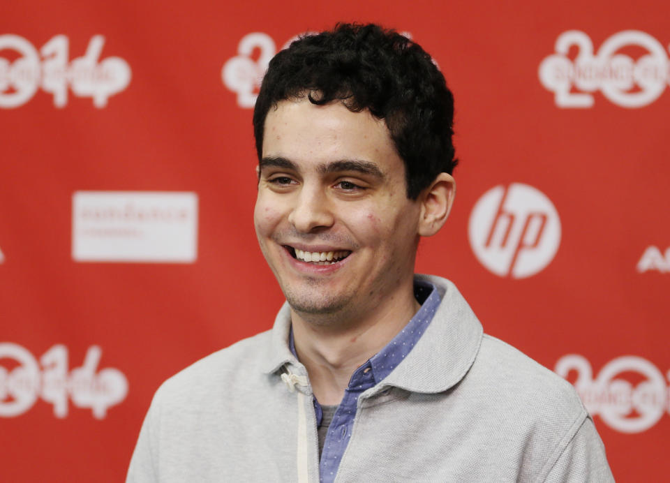 Director and screenwriter Damien Chazelle poses at the opening night premiere of the film "Whiplash" during the 2014 Sundance Film Festival, on Thursday, Jan. 16, 2014, in Park City, Utah. (Photo by Danny Moloshok/Invision/AP)