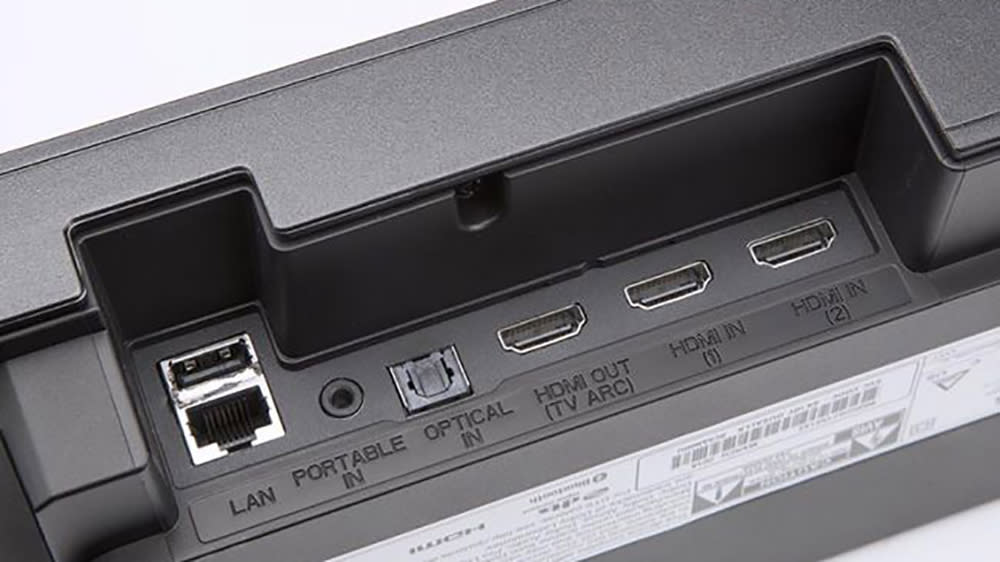  The connections at the rear of a soundbar, including three HDMI sockets, one of which is labelled 'TV ARC'. 
