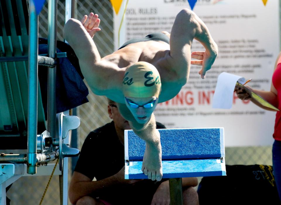 George Jenkins sophomore Dylan Cardosi dives into the pool to start the 200 individual medley at the 2022 Polk County Swimming and Diving Meet.