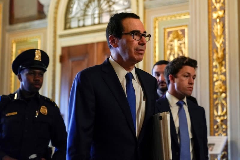 U.S. Secretary of the Treasury Mnuchin walks to the meeting for a coronavirus relief package in Washington