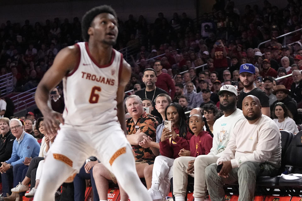 LeBron James was courtside with his family at USC on Sunday to watch Bronny’s debut with the Trojans