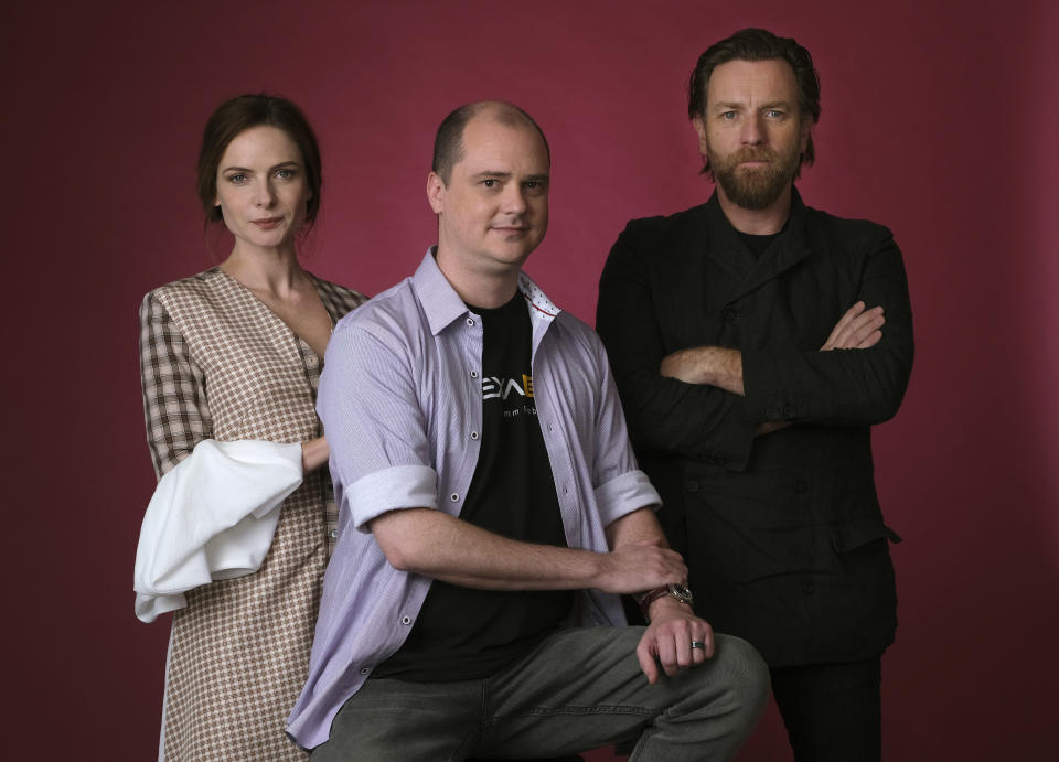 This Oct. 28, 2019 photo shows writer-director Mike Flanagan, center, and actors Rebecca Ferguson, left, and Ewan McGregor posing for a portrait to promote the film, "Doctor Sleep," at The London West Hollywood hotel in West Hollywood, Calif. (Photo by Chris Pizzello/Invision/AP)