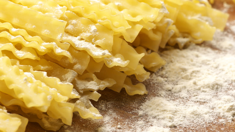 mafalda laid on table with flour