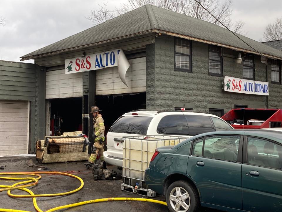 Firefighters respond to a fire at S&S Auto on Virginia Avenue south of Hagerstown on Friday.