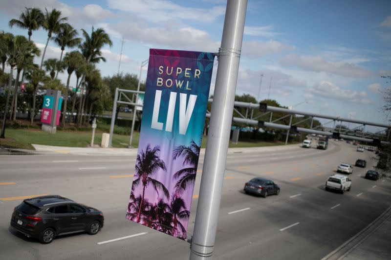 A banner advertising Super Bowl LIV between the San Francisco 49ers and the Kansas City Chiefs is displayed in Miami Gardens