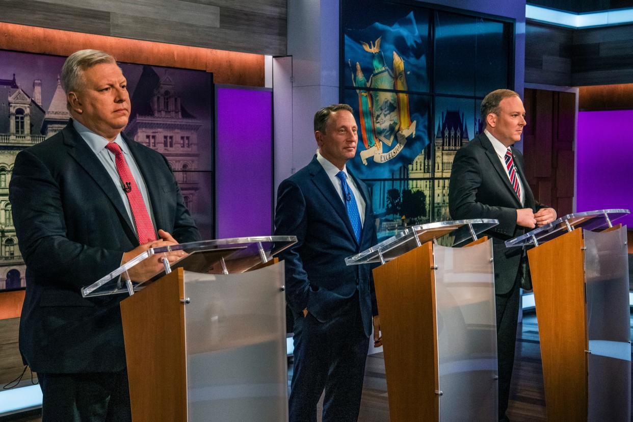 From left to right, businessman Harry Wilson, former Westchester County Executive Rob Astorino and Rep. Lee Zeldin face off during New York's Republican gubernatorial debate on Monday, June 20, 2022, in New York. 