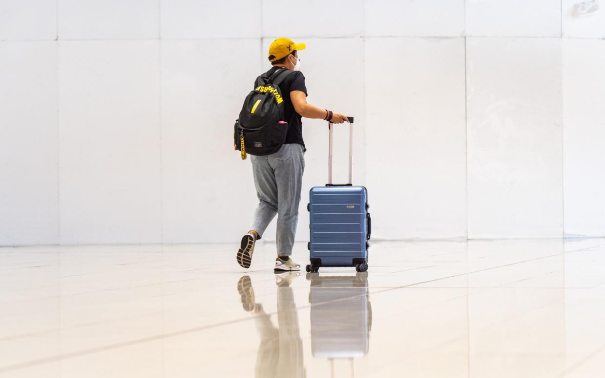 Traveler arrives at airport - Chan Long Hei 