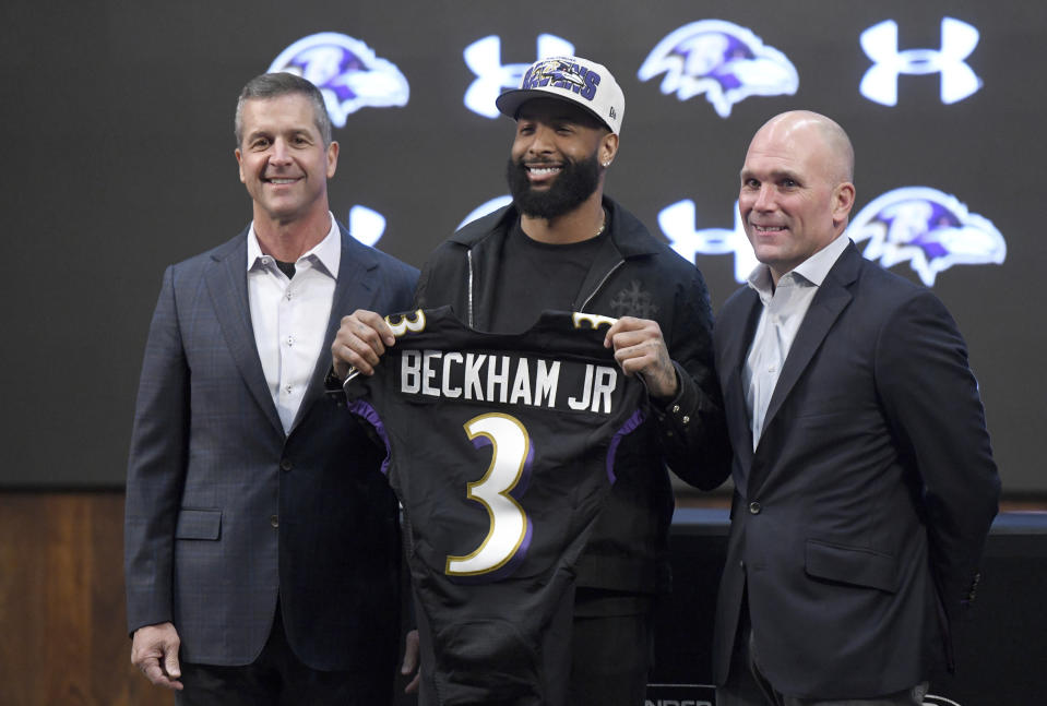 Recently signed Baltimore Ravens wide receiver Odell Beckham Jr., center, stands with head coach John Harbaugh, left, and general manager Eric DeCosta during a news conference at the team's practice facility in Owings Mills, Md., Thursday, April 13, 2023. (AP Photo/Steve Ruark)