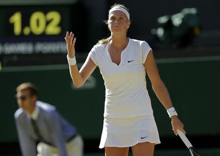 Petra Kvitova of the Czech Republic reacts during her match against Jelena Jankovic of Serbia at the Wimbledon Tennis Championships in London, July 4, 2015. REUTERS/Henry Browne