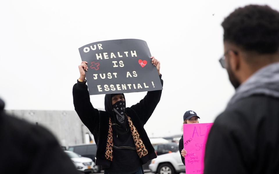 Christian Smalls protests outside his Amazon warehouse in Staten Island, New York on Monday - Jeenah Moon