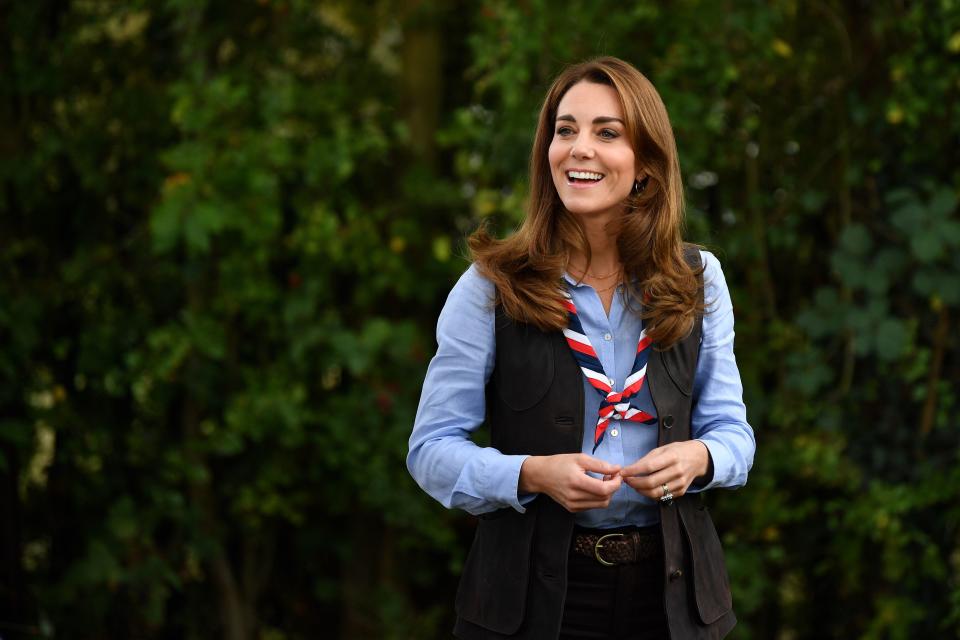 Britain's Catherine, Duchess of Cambridge, reacts as she arrives to visit a Scout Group in Northolt, northwest London on September 29, 2020, where she joined Cub and Beaver Scouts in outdoor activities. - The Duchess learned how the Scouts have adapted during the COVID-19 pandemic, and continued Scouting sessions and online activities. (Photo by Daniel LEAL-OLIVAS / various sources / AFP) (Photo by DANIEL LEAL-OLIVAS/AFP via Getty Images)