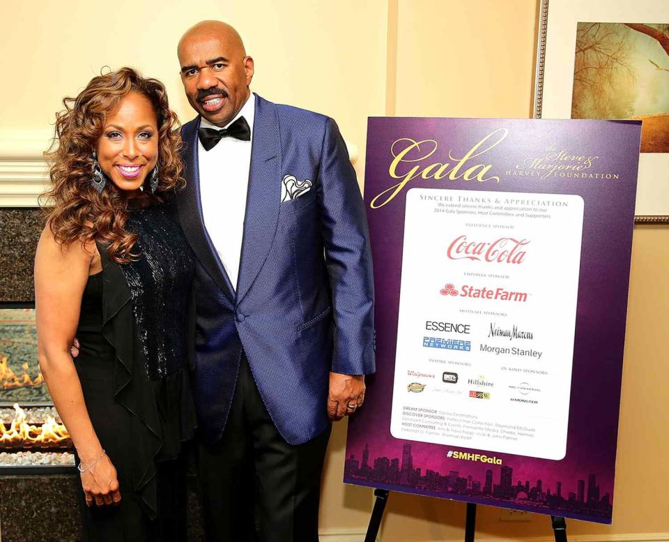 Marjorie and Steve Harvey attend the 2014 Steve & Marjorie Harvey Foundation Gala presented by Coca-Cola VIP Reception at the Hilton Chicago on May 3, 2014 in Chicago, Illinois