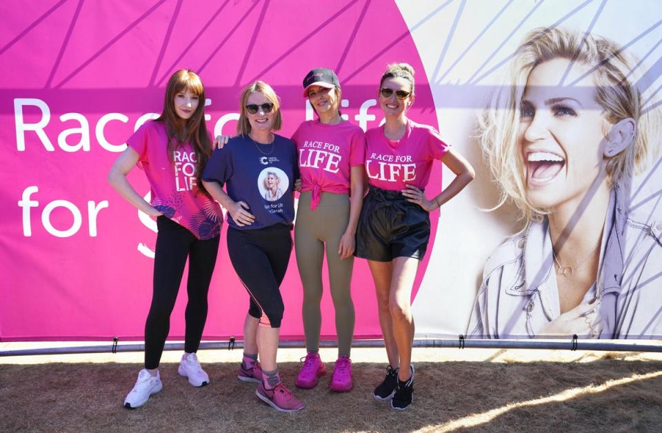 Michelle Mitchell, the chief executive of Cancer Research with the former Girls Aloud band members (Jonathan Brady/PA) (PA Wire)