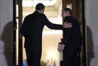 Greece's Prime Minister Kyriakos Mitsotakis, left, welcomes the US Secretary of State Antony Blinken before their meeting at Maximos Mansion in Athens, Greece, on Monday, Feb. 20, 2023. Blinken will be on a two-day trip in Athens, after his visit to Turkey, to meet with the country's leadership and launch the fourth round of the US-Greece Strategic Dialogue.(AP Photo/Thanassis Stavrakis)