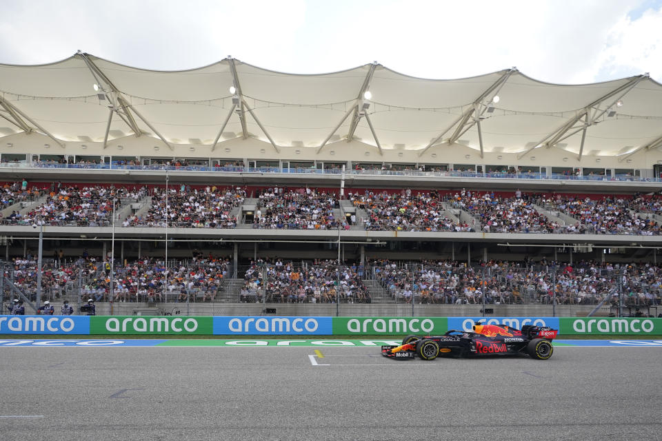 Red Bull driver Max Verstappen, of the Netherlands, drives down the main straightaway during qualifications for the F1 U.S. Grand Prix auto race at Circuit of the Americas, Saturday, Oct. 23, 2021, in Austin, Texas. (AP Photo/Darron Cummings, Pool)