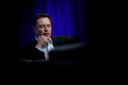 FILE PHOTO: Tesla Motors CEO Elon Musk speaks during the National Governors Association Summer Meeting in Providence, Rhode Island, U.S., July 15, 2017. REUTERS/Brian Snyder/File Photo