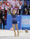 Yulia Lipnitskaya of Russia waves to spectators after competing in the women's team short program figure skating competition at the Iceberg Skating Palace during the 2014 Winter Olympics, Saturday, Feb. 8, 2014, in Sochi, Russia. (AP Photo/Vadim Ghirda)