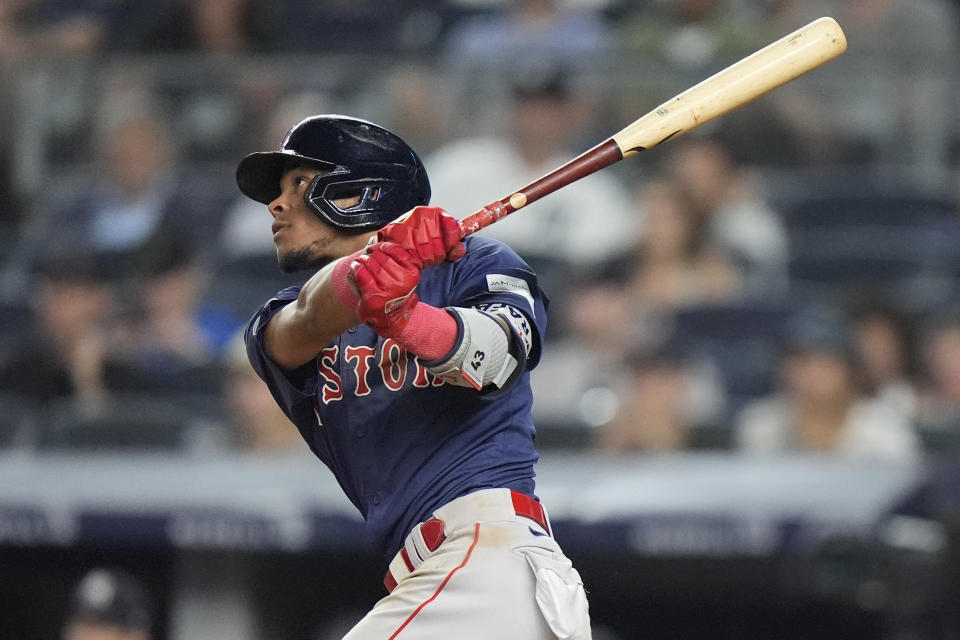 Boston Red Sox's Ceddanne Rafaela follows through on a two-run home run during the 10th inning of a baseball game against the New York Yankees, Friday, July 5, 2024, in New York. (AP Photo/Frank Franklin II)